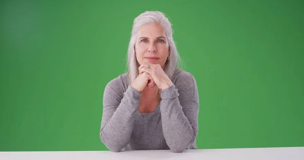 Elderly Caucasian Woman Sitting Looking Camera Greenscreen — Stock Photo, Image
