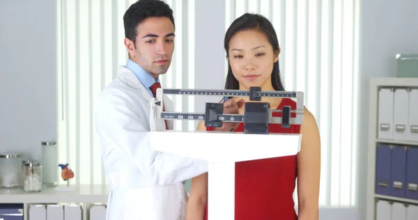 Happy Chinese Patient Being Weighed Scales — Stock Photo, Image