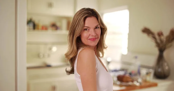 Caucasian Woman Smiling Blowing Kisses Camera Kitchen — Stock Photo, Image