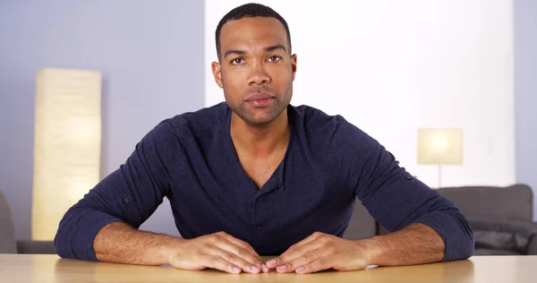 Black Man Table Looking Camera — Stock Photo, Image