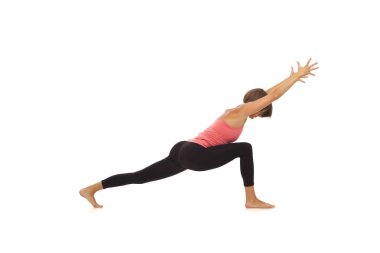 Yoga yapan genç kadın.