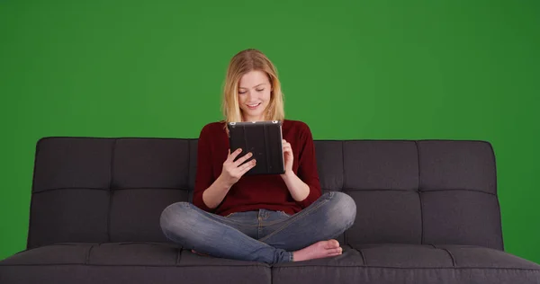 Millennial Relaxed Sofa Browsing Internet Digital Tablet Green Screen — Stock Photo, Image