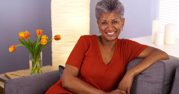 Cheerful African Grandmother Sitting Couch — Stock Photo, Image
