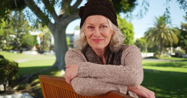 Confident Elderly Caucasian Woman Posing While Sitting Public Park Bench — Stock Photo, Image