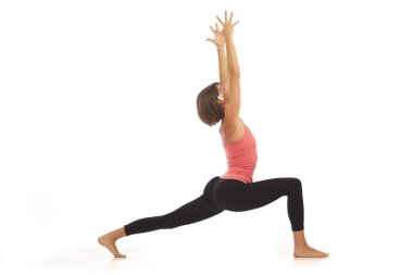 Yoga yapan genç kadın.