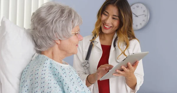 Japanese Doctor Showing Elderly Patient Information Tablet Computer — Stock Photo, Image