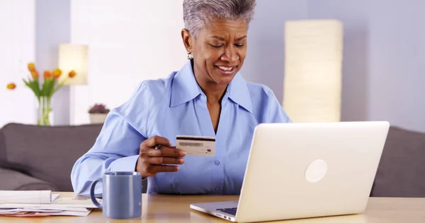 Mature Black Woman Happily Paying Her Bills — Stock Photo, Image