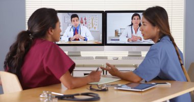 Group of diverse medical doctors video conferencing clipart