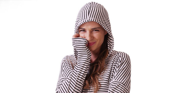 Portrait of pretty white girl looking at camera cheerfully on white background