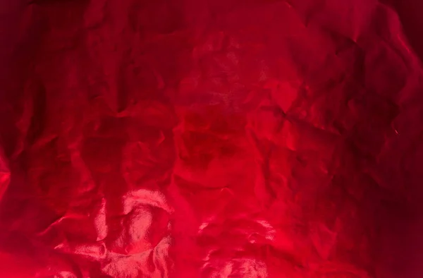 Renk renklendirmeli buruşmuş folyo. Renkli kağıt. Kırmızı renk.