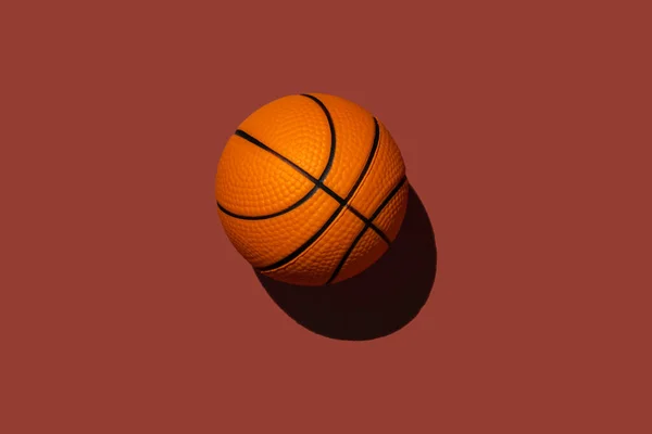Small Toy Basketball Hard Shadow Terracotta Background — Stock Photo, Image