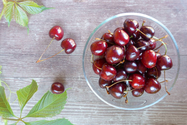 ripe sweet cherry in a plate