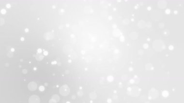 Yüzen ışık parçacıkları ile parlayan gümüş beyaz bokeh arkaplan.