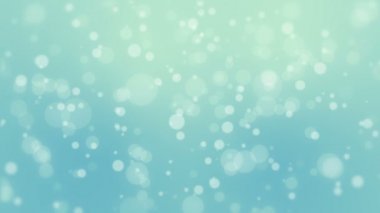 Mavi yeşil bokeh arka plan ışık parçacıkları yüzen ile parlayan.