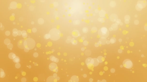 Fond bokeh jaune orangé brillant avec des particules de lumière flottantes .