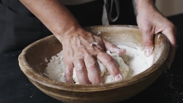 Baker hands kneading dough — Stock Video