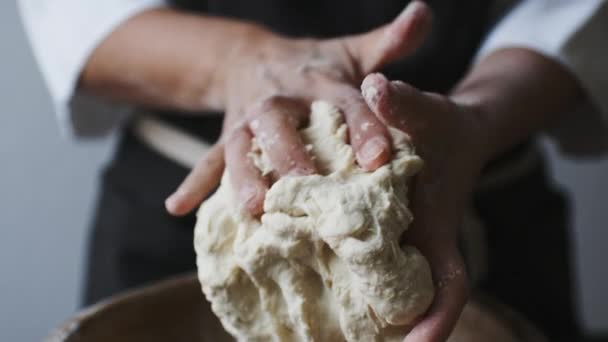 Baker hands kneading dough — Stock Video