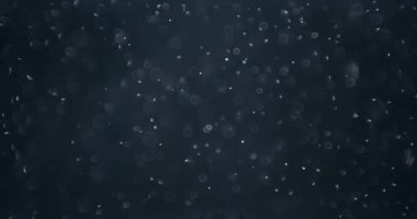 Parçacıklar ve suda yavaşça mürekkep