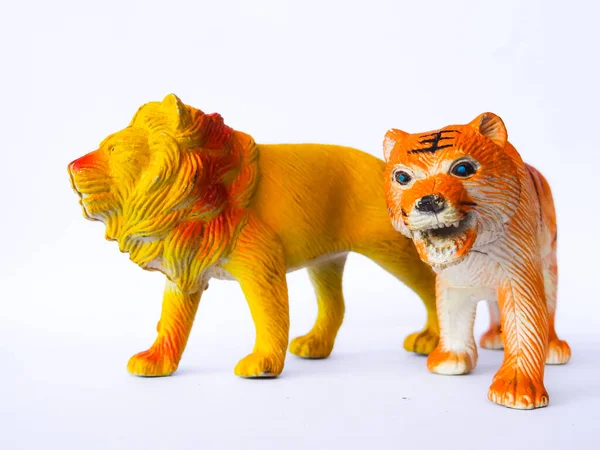 lion and tiger animal toy on white background