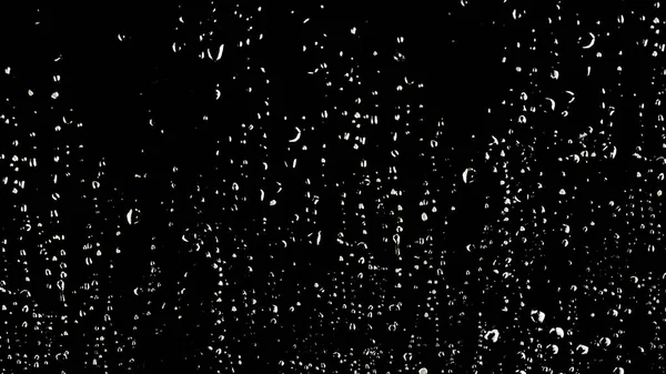 Yağmur mevsimi geldiğinde siyah zemin üzerindeki camların üzerine beyaz yağmur damlası veya su damlası rengi.