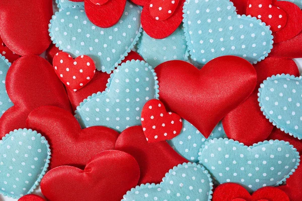 Hearts. Many red and blue hearts with polka dots. Valentine\'s background