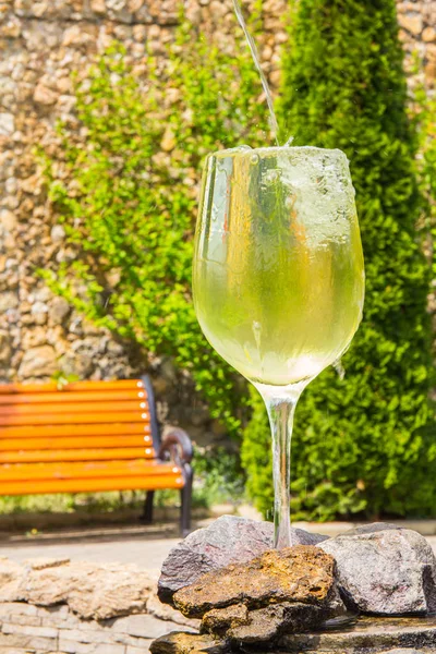 Beautiful view to wine fountain outside the winery on Moldavia in sunny summer day. — Stock Photo, Image