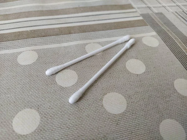 Cotton buds on the table isolated close-up