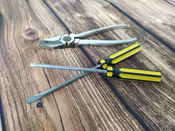 Steel Pliers Screwdrivers Wooden Table — Stock Photo, Image