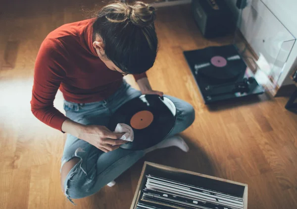 Young Audiophile Sitting Floor Cleaning Dust Form Her Vinyl Record Stock Picture