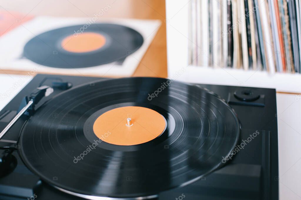 Turntable with gramophone record playing music. Gramophone, vinyl, lp, turntable needle
