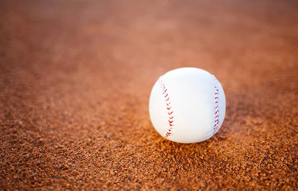 Baseball ball on baseball field