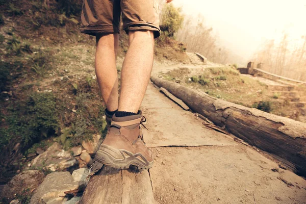 Hiker Legs Crossing Mountain River Bridge — Stock Photo, Image