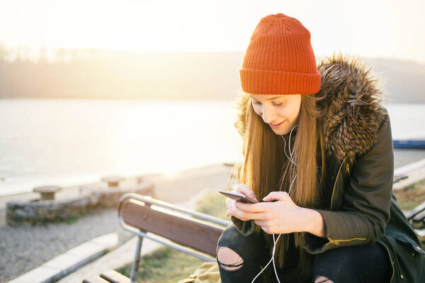 Hipster Girl Using Smart Phone Outdoors Woman Texting Message Royalty Free Stock Photos