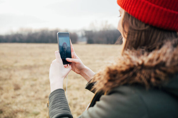 Hipster Girl Using Smart Phone Outdoors Woman Doing Selfie Stock Picture