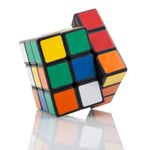 KRAGUJEVAC, SERBIA - JANUARY 14, 2014: Rubik's cube on the white background. Rubik's Cube invented by a Hungarian architect Erno Rubik in 1974.