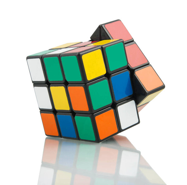 KRAGUJEVAC, SERBIA - JANUARY 14, 2014: Rubik's cube on the white background. Rubik's Cube invented by a Hungarian architect Erno Rubik in 1974.