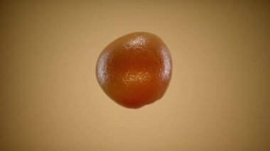 Taze meyve portakalları ve greyfurtlar havada asılı ve yere düşüyor.