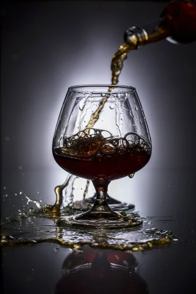 Pouring Brandy Glass — Stock Photo, Image