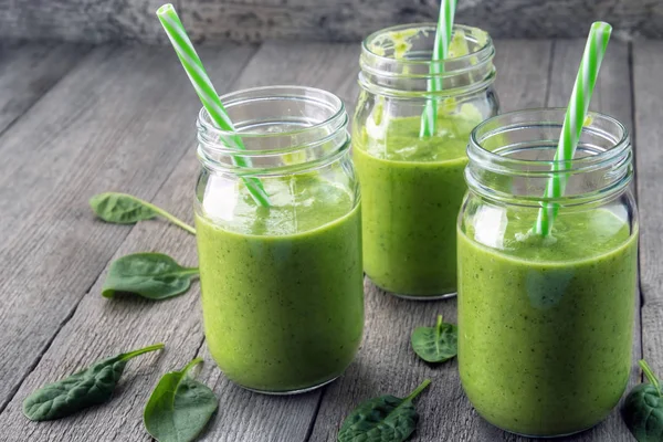 Three Green Smoothies Made Avocado Kiwi Spinach Kale Leaves Gray — Stock Photo, Image