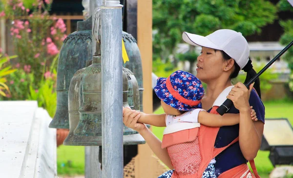 Asian Woman Holding Baby Ring Bell Temple Holiday — Stock Photo, Image