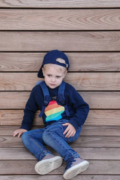 Little Boy Blue Cap Sits Bench Resting Thinking Something — Stock Photo, Image
