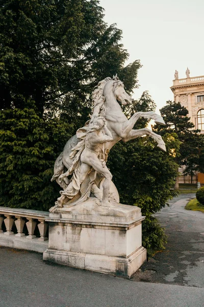 Sculpture of man taming a rearing horse, Maria-Theresien-Platz, Vienna, Austria