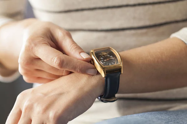 Close Woman Winding Her Wrist Watch — Stock Photo, Image