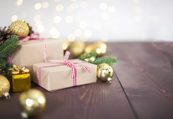 Christmas gift boxes on wooden table