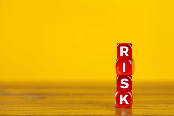 Risk word on glossy red blocks — Stock Photo, Image