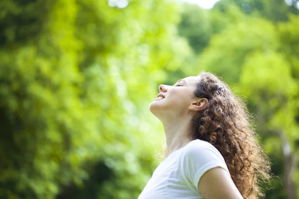 Woman breathing fresh air outdoors in summer — Stock Photo, Image