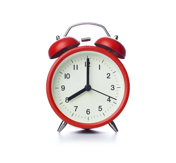 Un reloj despertador sale