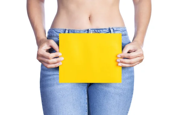 Woman hands holding an empty yellow advertising banne — Stock Photo, Image