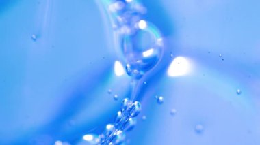 Sabun köpükleri, makro manzara. Mavi arkaplan.