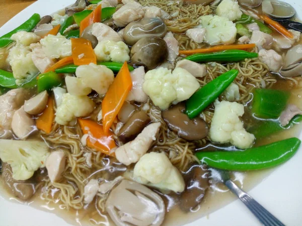 This is my home cooked Chinese and Cantonese style vegetarian Sang Mee (Noodle). The gravy and ingredients are mushroom, ginger slice, carrot, white broccoli. Stir well with sesame oil, vegetarian oyster sauce add some salt and sugar.